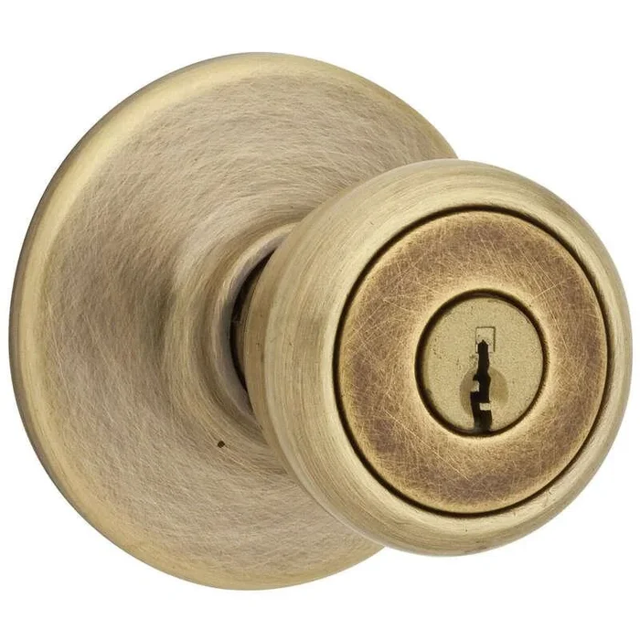 Kwikset Tylo Antique Brass Entry Knobs ANSI/BHMA Grade 3 1-3/4 in.
