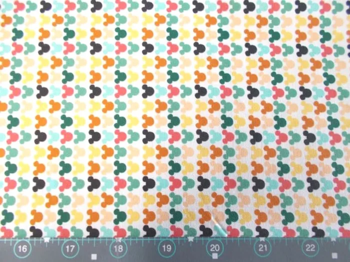 Mickey Multi Color Head Silhouettes on White Fabric – 85271080-01 – Disney Mickey & Minnie – Camelot Fabrics