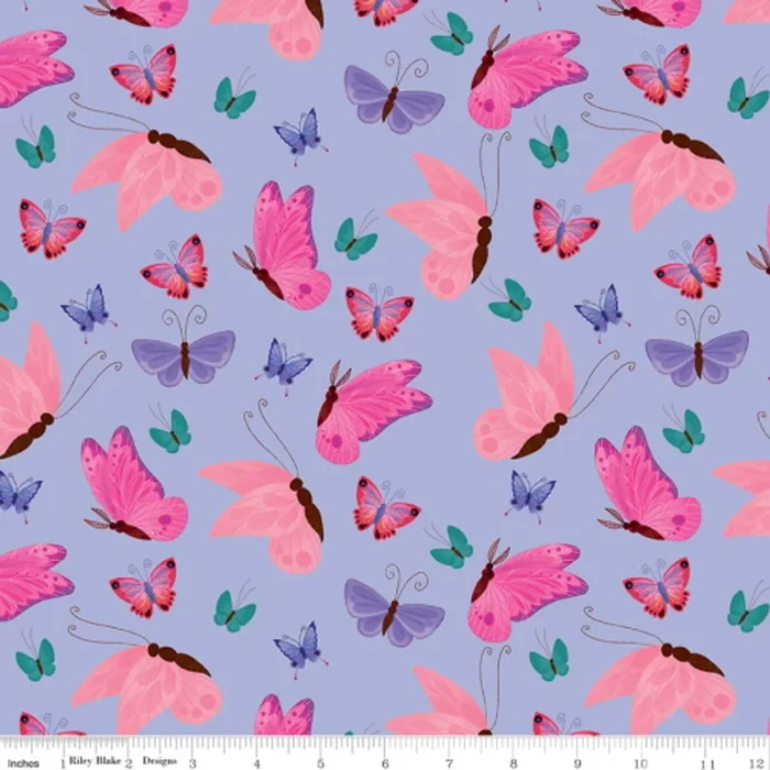 MULTI-COLORED BUTTERFLIES ON LIGHT PURPLE FABRIC – C9982 Light Purple – Uni the Unicorn – Riley Blake Designs